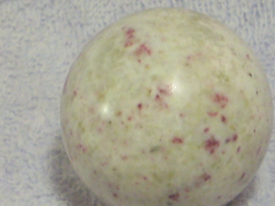 White sphere with pink speckles, approximately 1+<sup>3</sup>/<sub>4</sub> inch (45